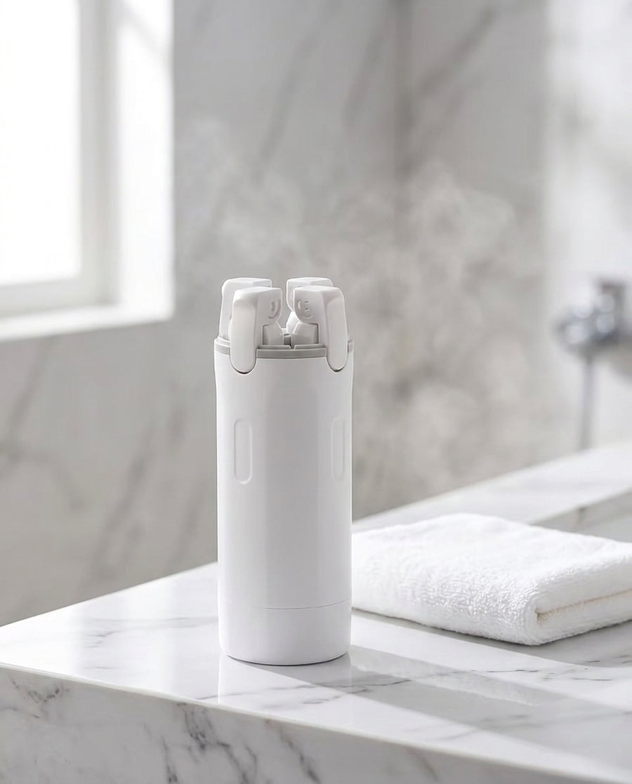 Hand holding pocket-sized Tripstash 4-in-1 travel bottle showing TSA-friendly size
