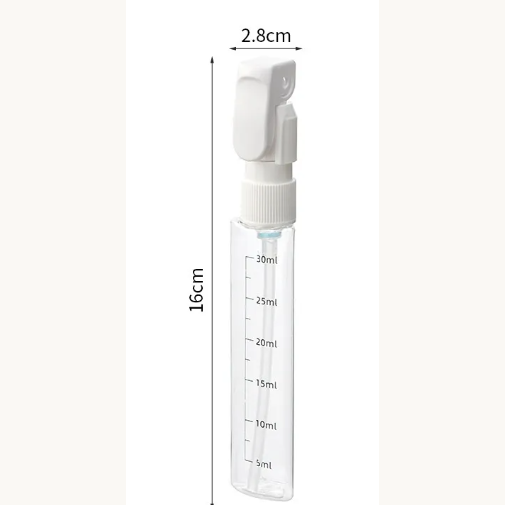 Close up of an inner bottle showing printed ml scale markings from 5 to 30